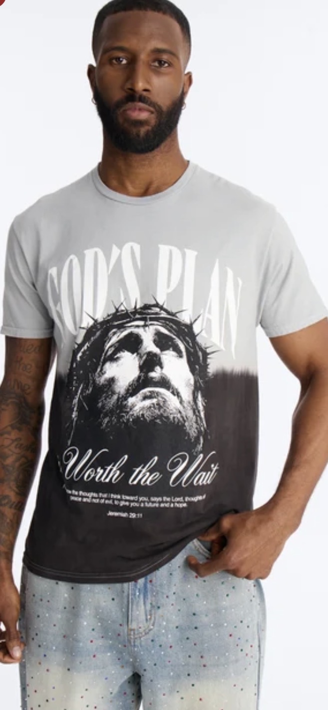 Model wearing a grey-to-black dip-dye tee reading God's Plan, Worth the Wait