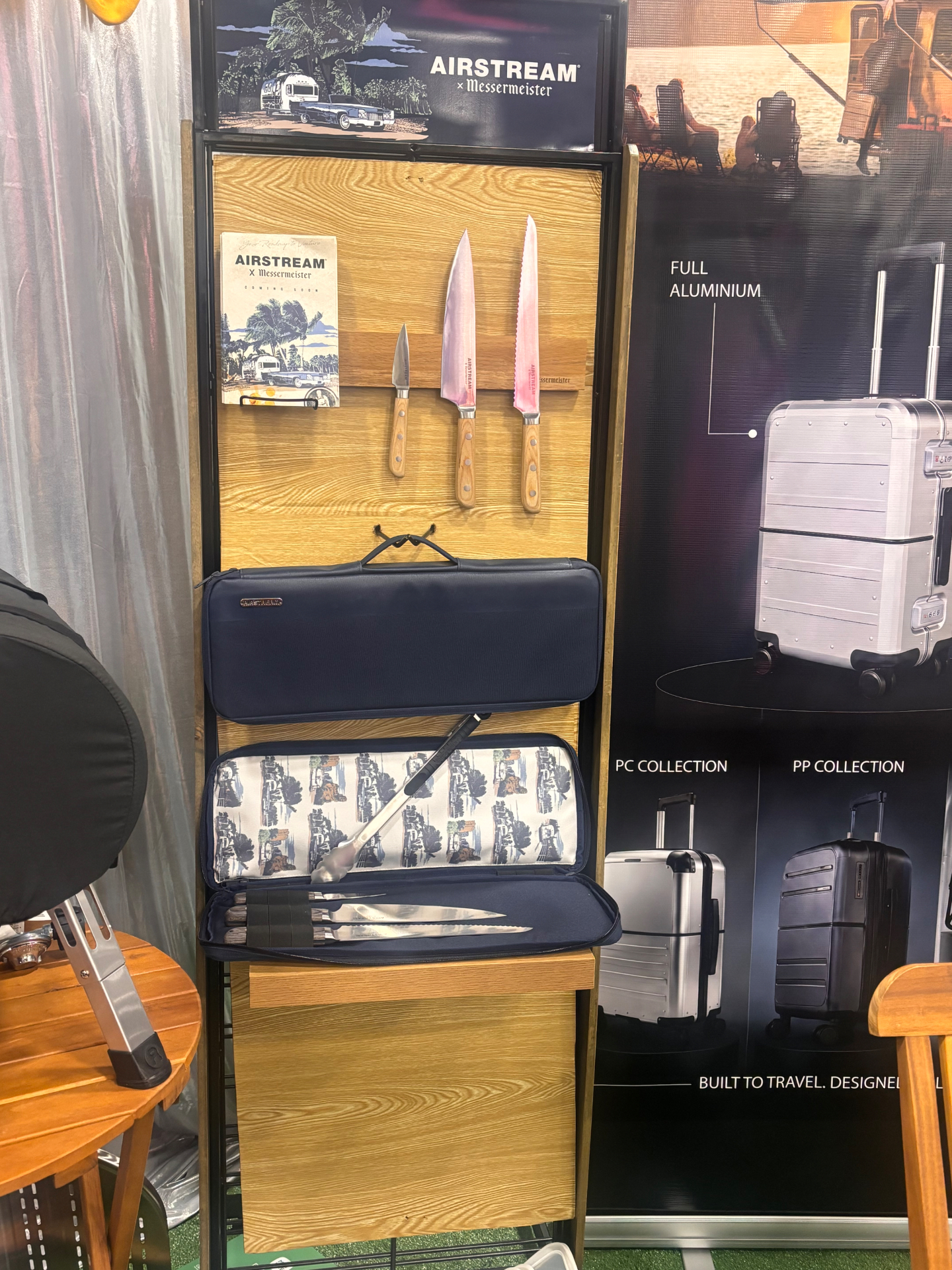 Airstream x Messermeister knife collection displayed on wood with a navy zippered knife case