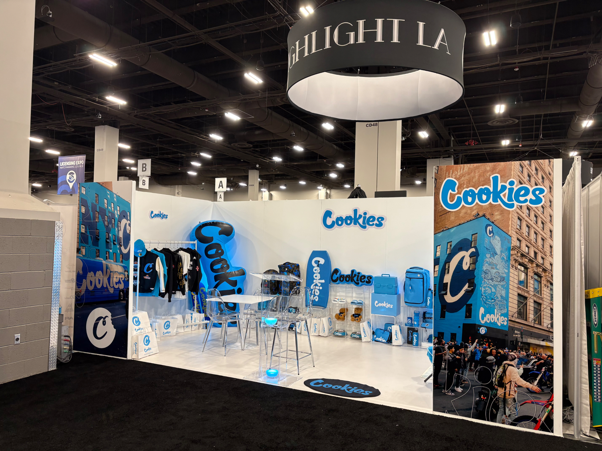 Highlight LA booth at Licensing Expo showcasing the Cookies brand program with apparel, bags, and signage