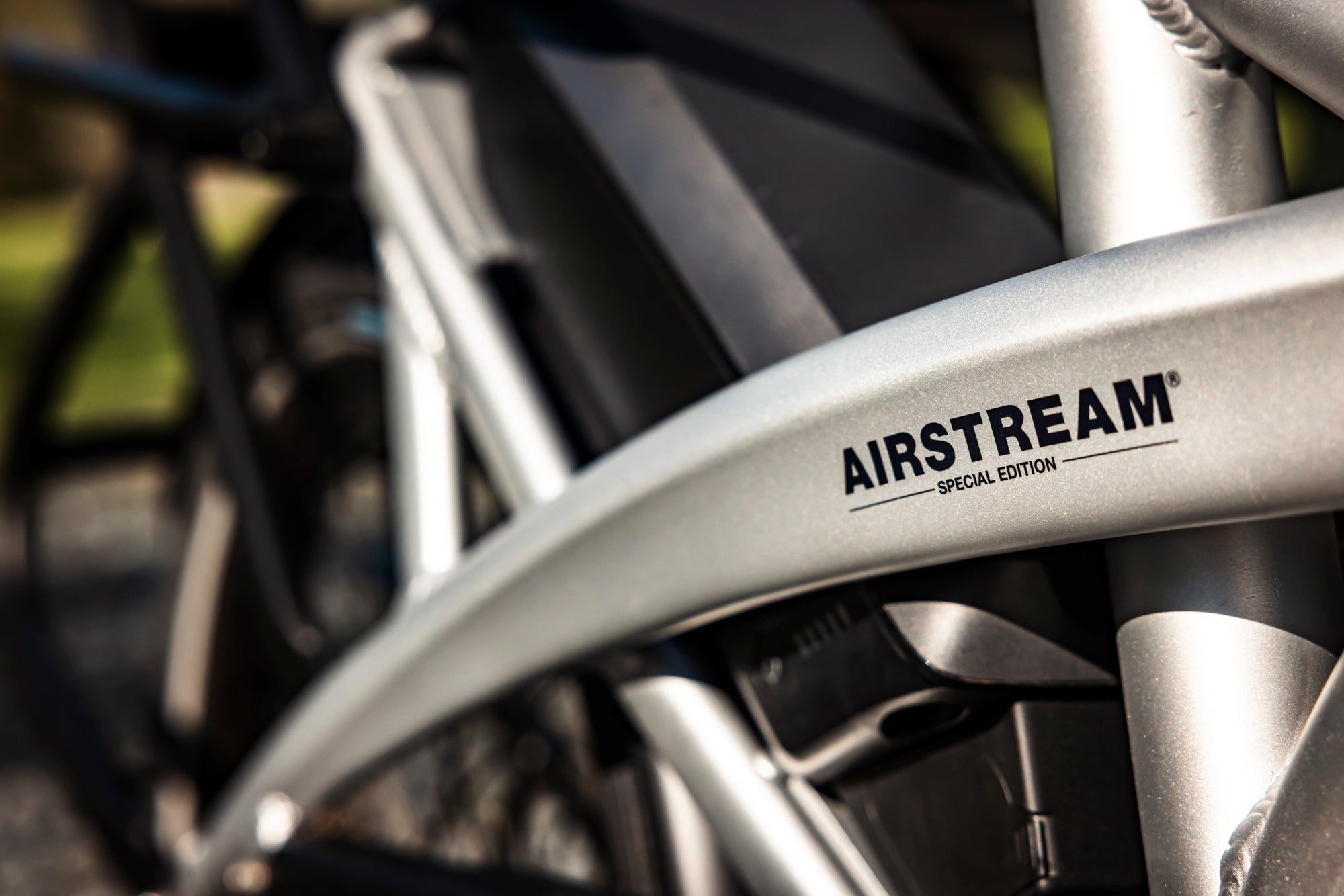 Tern Bicycles and Airstream special edition compact e-bikes on an outdoor camping adventure